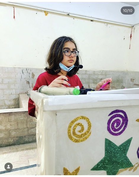 Myra speaking at event