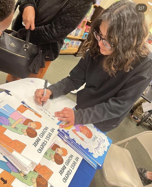 Myra signing books at bookstore