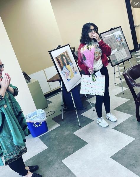 Myra receiving recognition at event